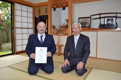 Receiving his 7th Dan from the Doshu